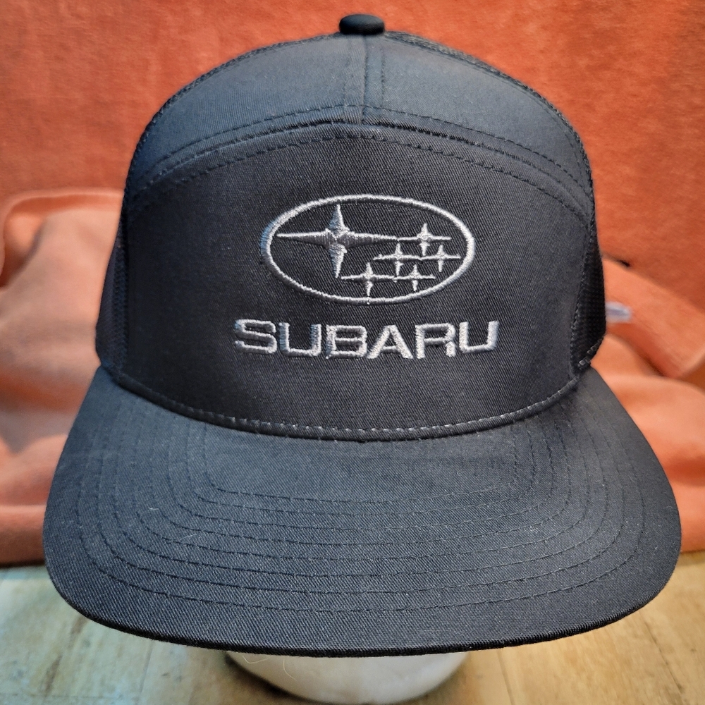 Subaru black trucker hat , made in Canada mint shape .